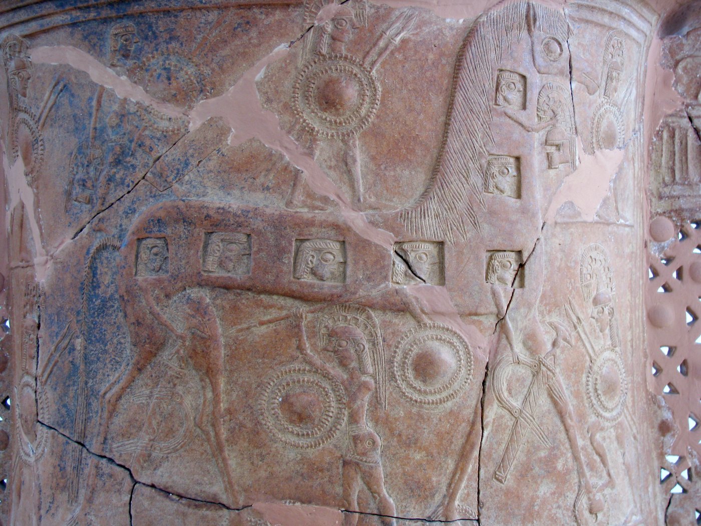 Relief pithos from Mykonos showing the Trojan Horse, with warriors' heads visible in the portholes along its flank